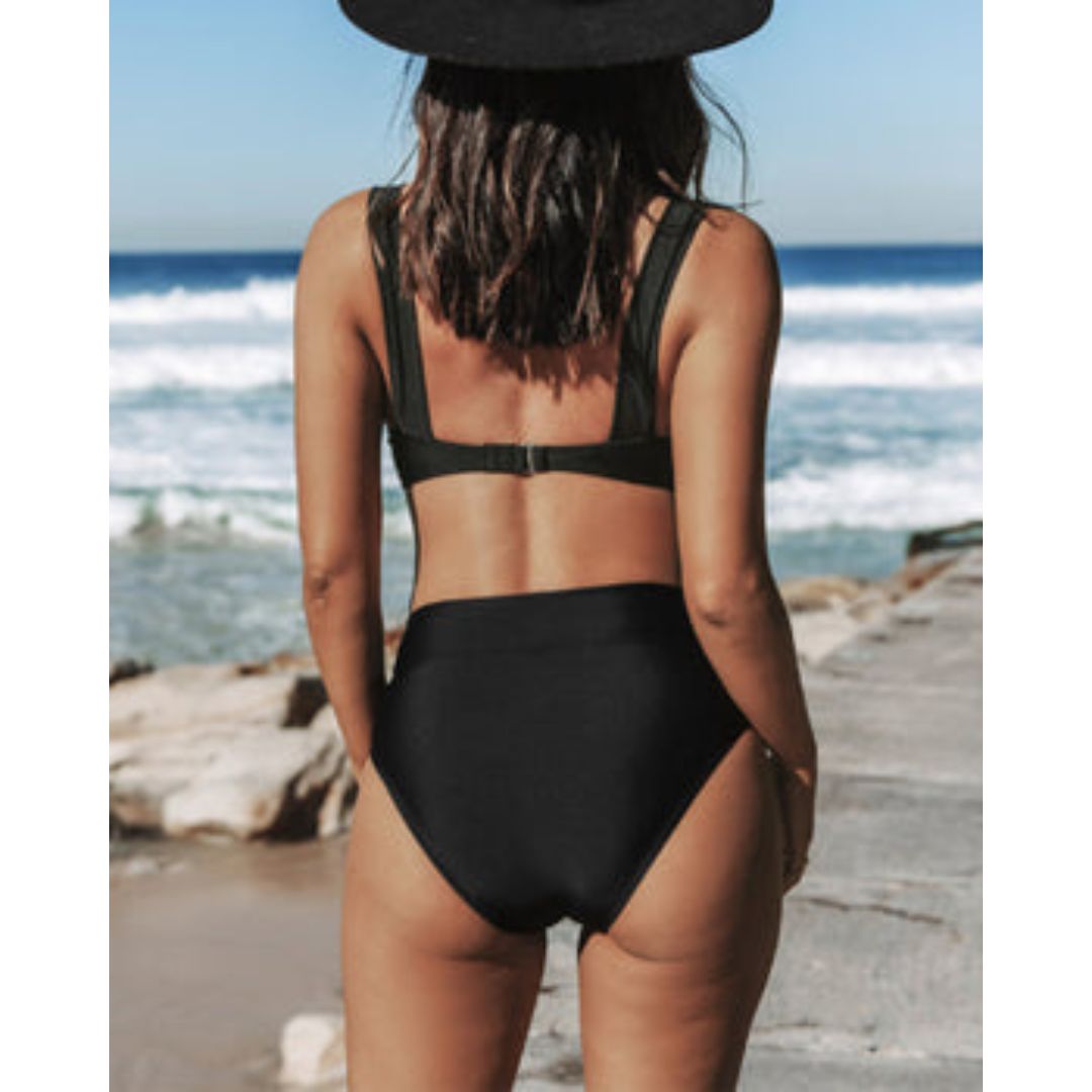 Women's sleek high-waist swimsuit in solid color, confident and elegant style