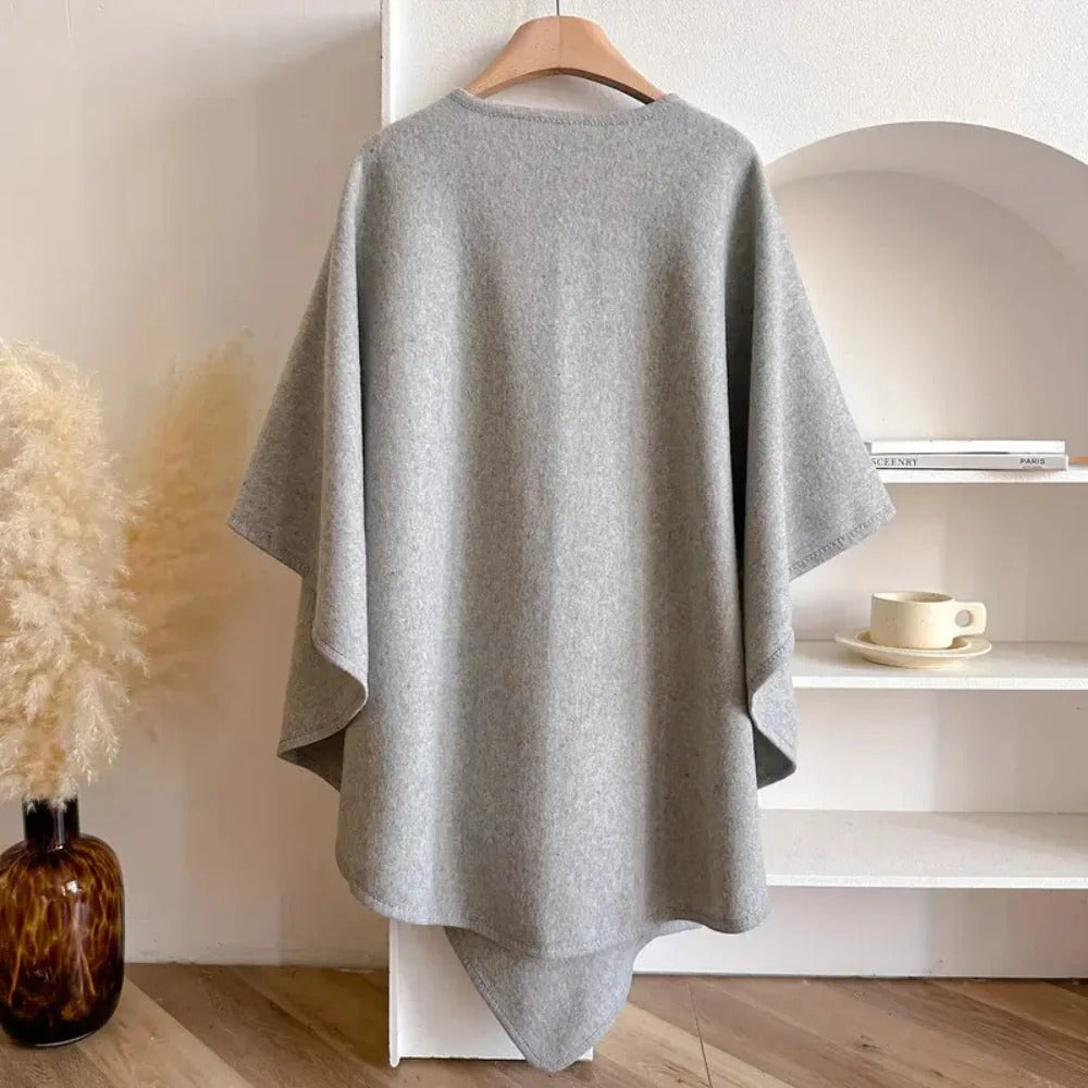 Wolmix Poncho met Lus