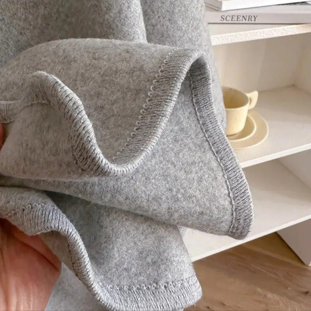 Wolmix Poncho met Lus